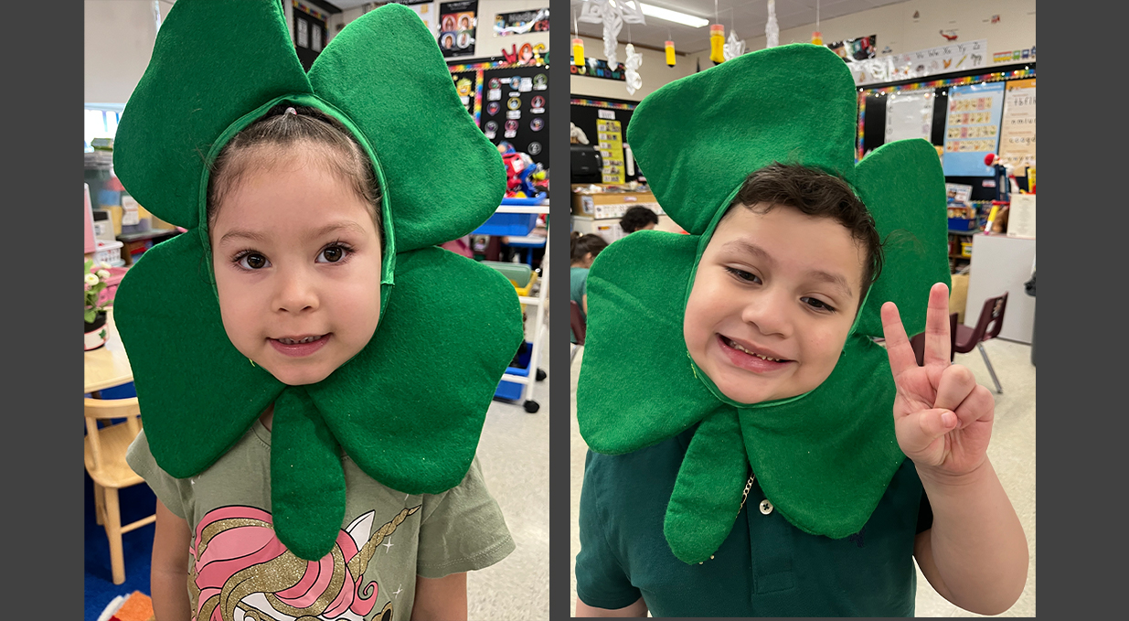 students with 4 leaf clover costume
